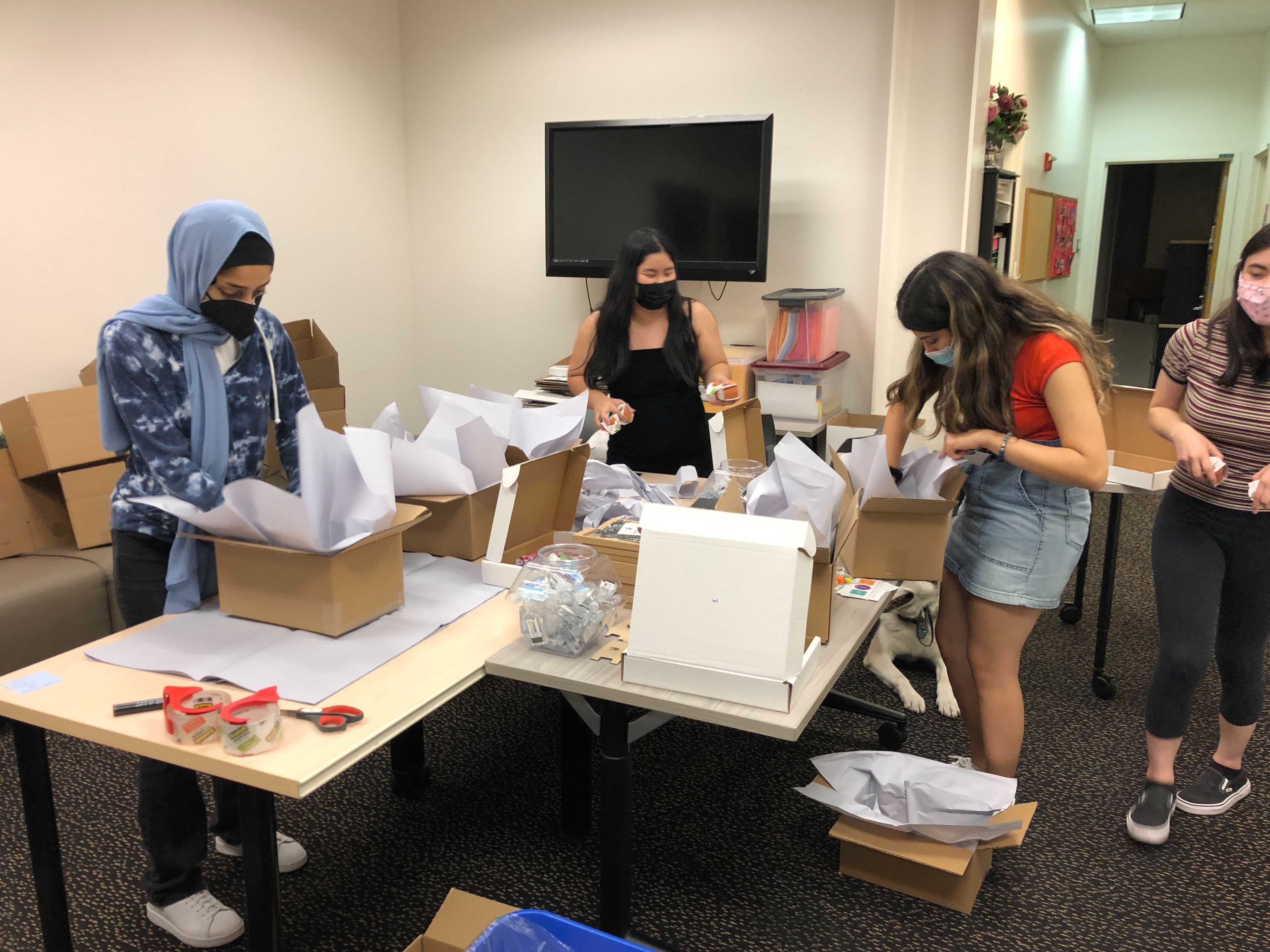 Packing care packages for AA/PI students